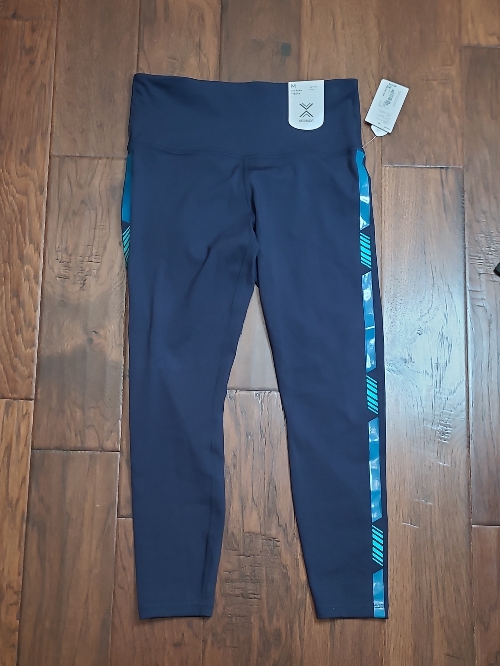 NWT Xersion Navy Blue 7/8 Leggings with Teal Accent Stripe size Medium